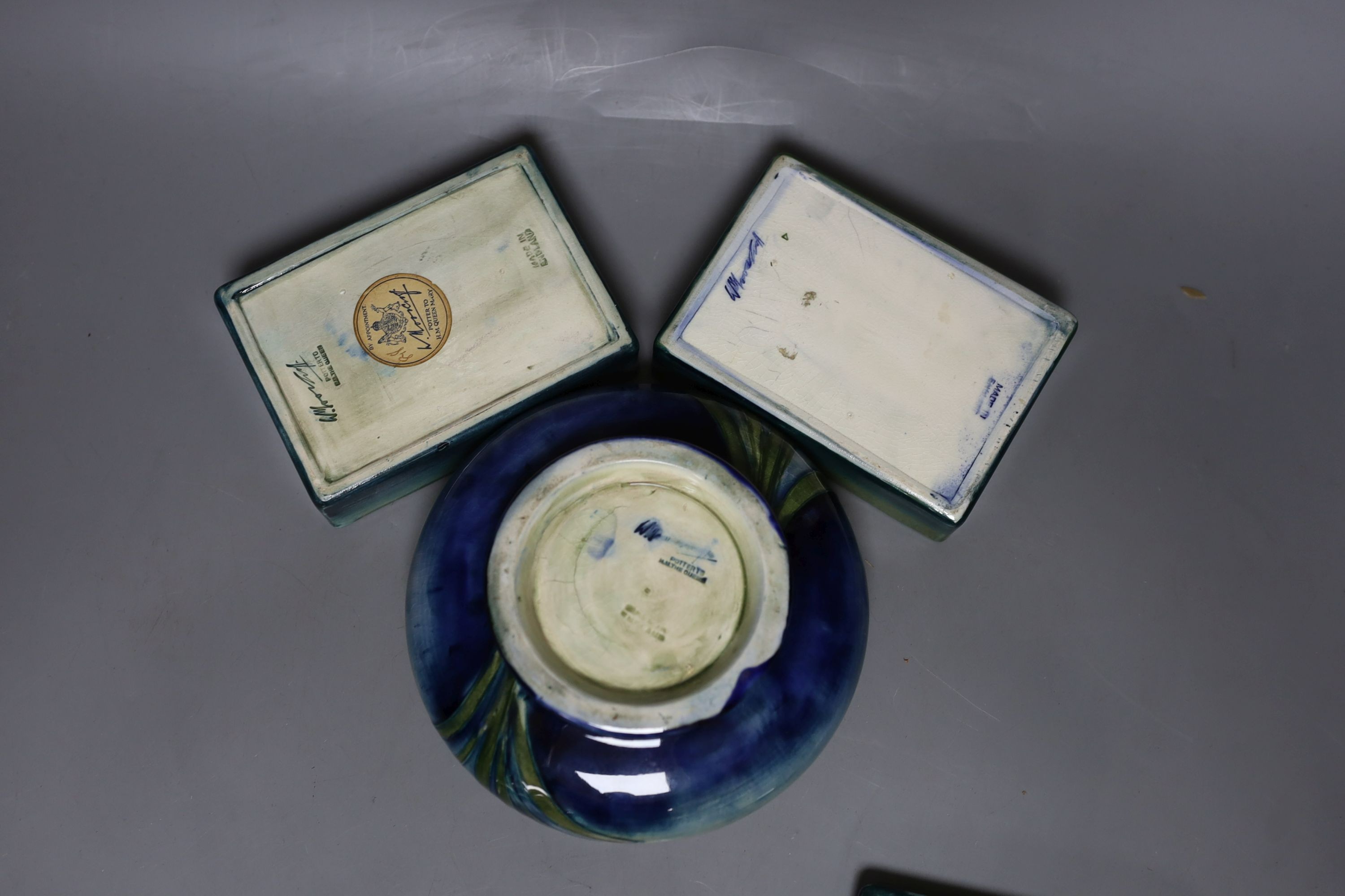 A pair of Moorcroft boxes with covers, together two other moorcroft pots (4)